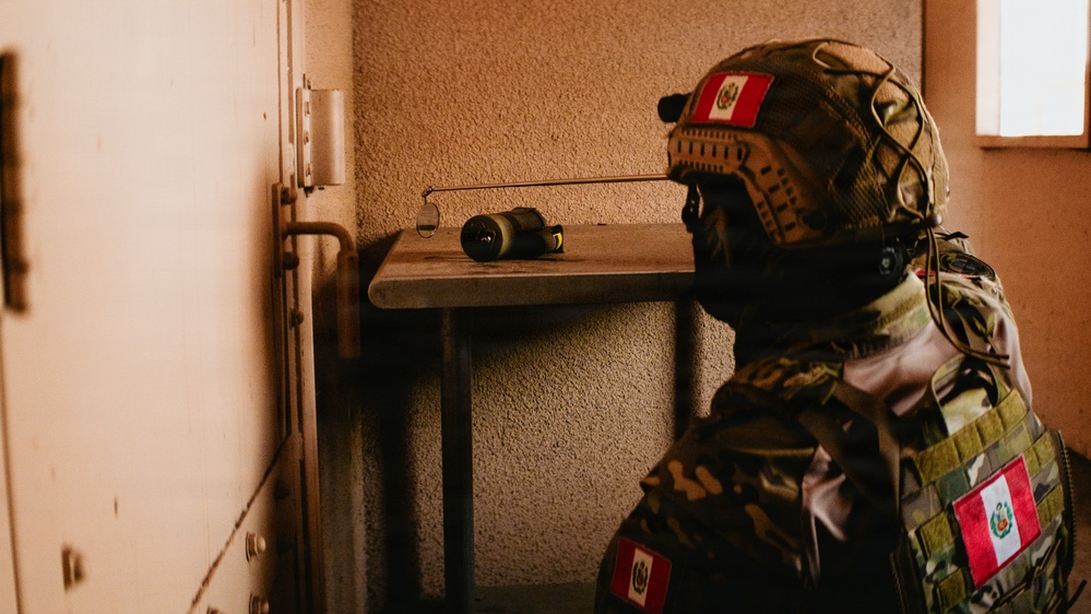 U.S. Navy and Peruvian Navy EOD participate in a dismounted response drill during RIMPACk 2026
