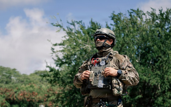 U.S. Navy and Partner EOD Forces participate in a dismounted response drill during RIMPAC 2026