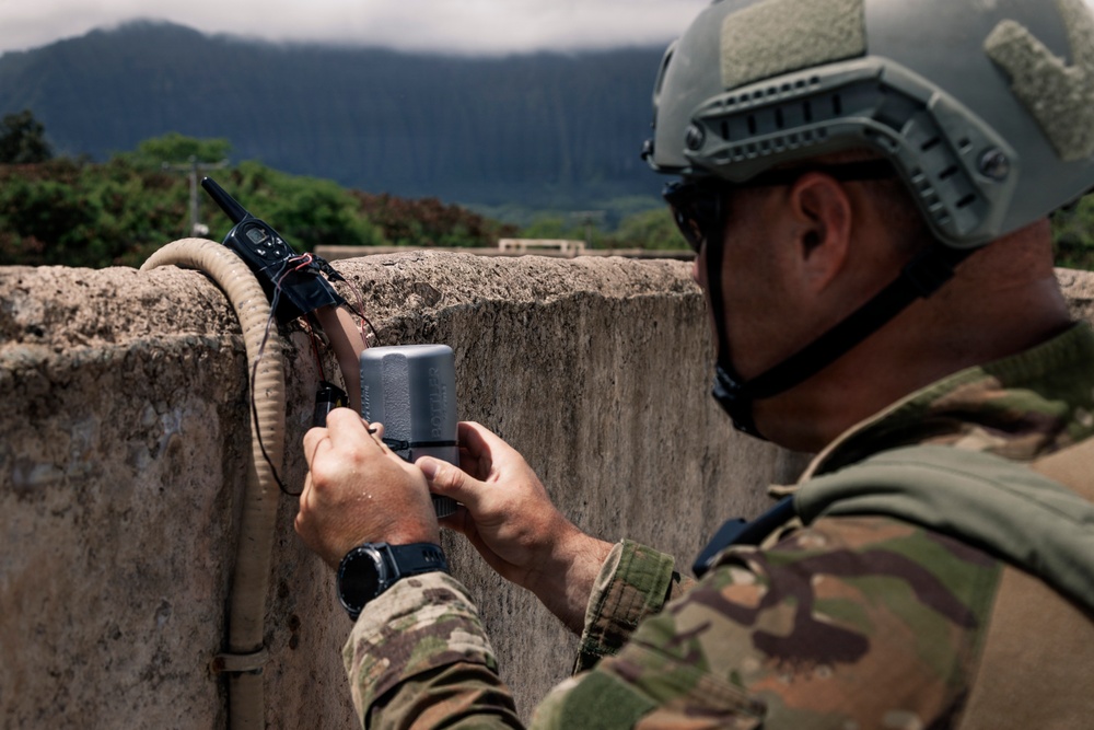 U.S. Navy and Partner EOD Forces participate in a dismounted response drill during RIMPAC 2026