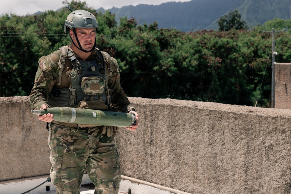 U.S. Navy and Partner EOD Forces participate in a dismounted response drill during RIMPAC 2026