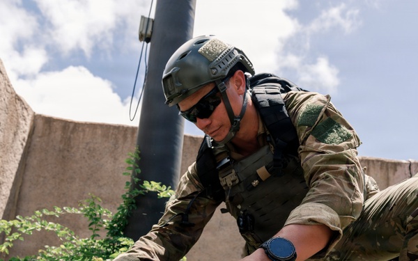 U.S. Navy and Partner EOD Forces participate in a dismounted response drill