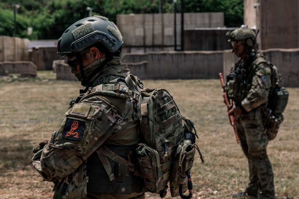 U.S. Navy and Partner EOD Forces participate in a dismounted response drill