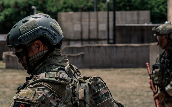 U.S. Navy and Partner EOD Forces participate in a dismounted response drill