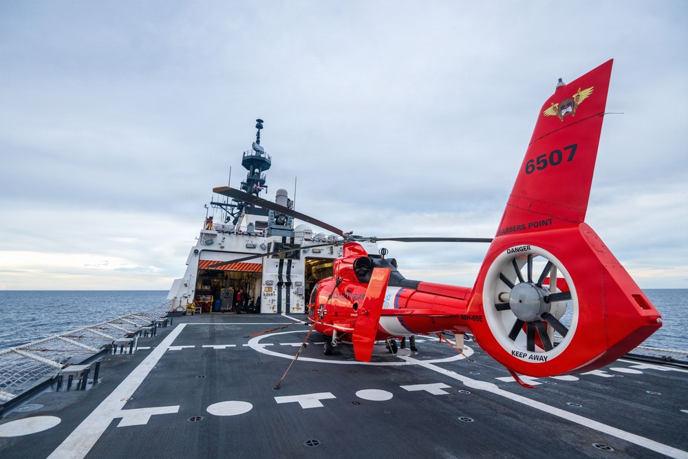 USCGC Midgett (WMSL 757) conducts night flight operations in the South China Sea