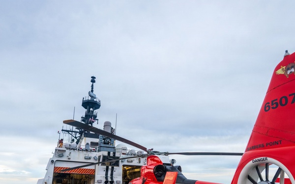 USCGC Midgett (WMSL 757) conducts night flight operations in the South China Sea