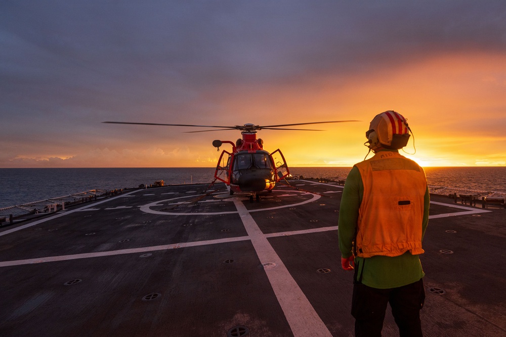 USCGC Midgett (WMSL 757) conducts night flight operations in the South China Sea