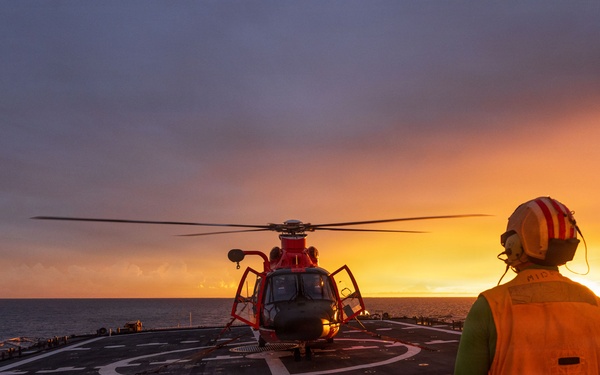 USCGC Midgett (WMSL 757) conducts night flight operations in the South China Sea
