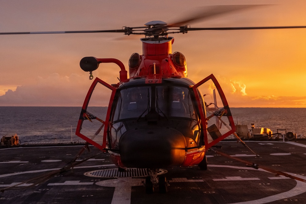USCGC Midgett (WMSL 757) conducts night flight operations in the South China Sea