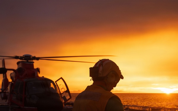 USCGC Midgett (WMSL 757) conducts night flight operations in the South China Sea