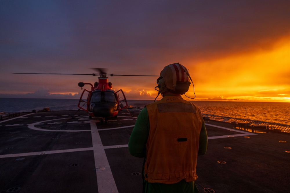 USCGC Midgett (WMSL 757) conducts night flight operations in the South China Sea