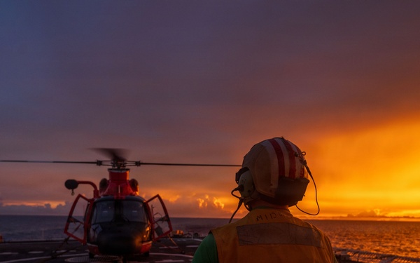 USCGC Midgett (WMSL 757) conducts night flight operations in the South China Sea