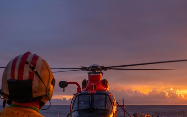 USCGC Midgett (WMSL 757) conducts night flight operations in the South China Sea