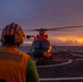 USCGC Midgett (WMSL 757) conducts night flight operations in the South China Sea