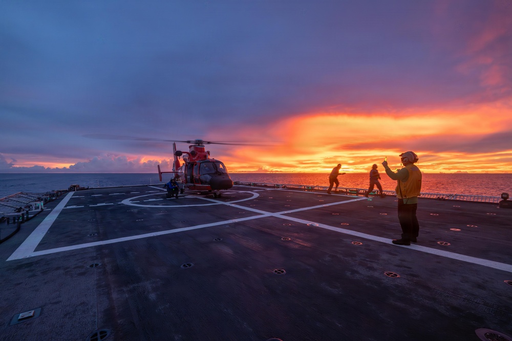 USCGC Midgett (WMSL 757) conducts night flight operations in the South China Sea