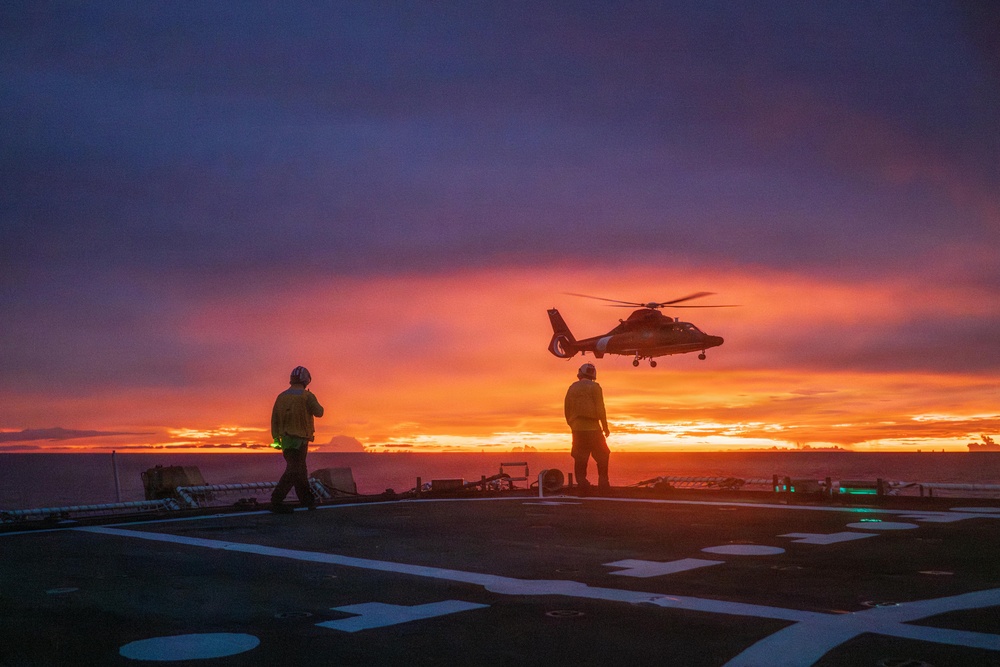 USCGC Midgett (WMSL 757) conducts night flight operations in the South China Sea