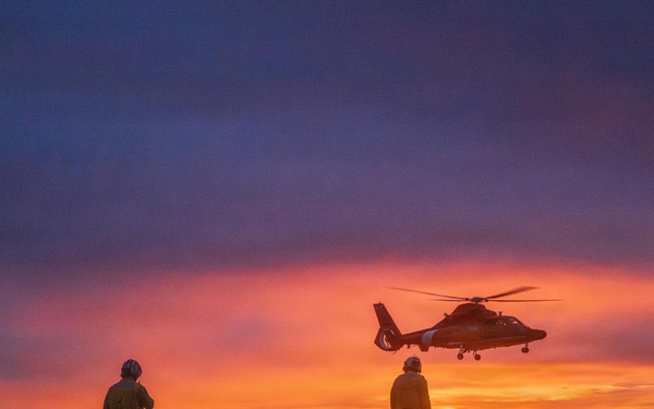 USCGC Midgett (WMSL 757) conducts night flight operations in the South China Sea
