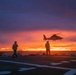 USCGC Midgett (WMSL 757) conducts night flight operations in the South China Sea