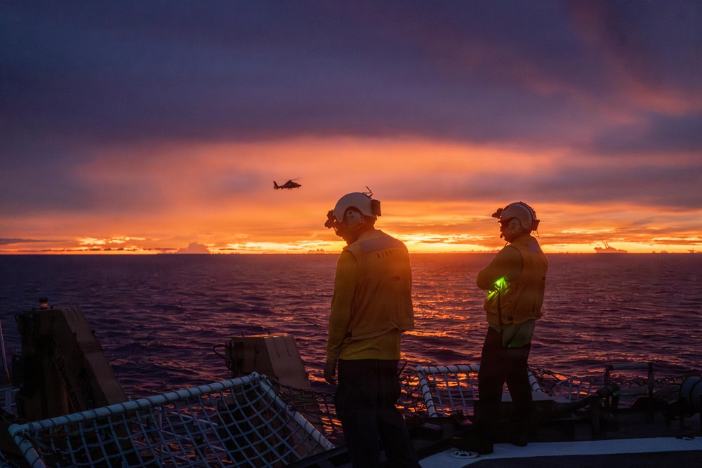 USCGC Midgett (WMSL 757) conducts night flight operations in the South China Sea