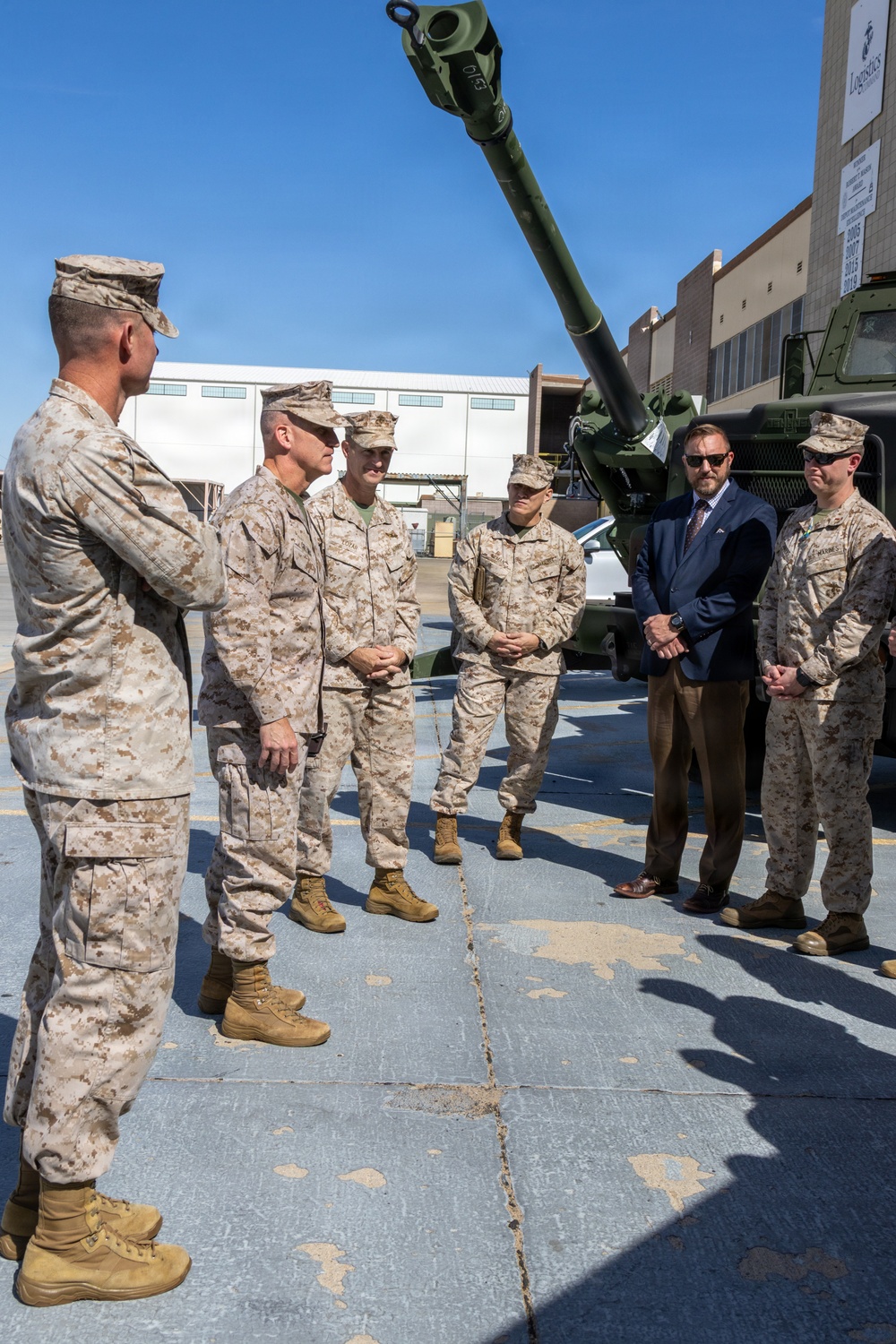 Brigadier General Kevin Collins, commanding general, Marine Corps Logistics Command, meets with civilian-Marines