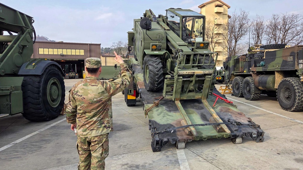 Soldier guides RTCH during Truck/MHE Rodeo competition