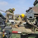 Soldiers secure armored vehicle during winch training