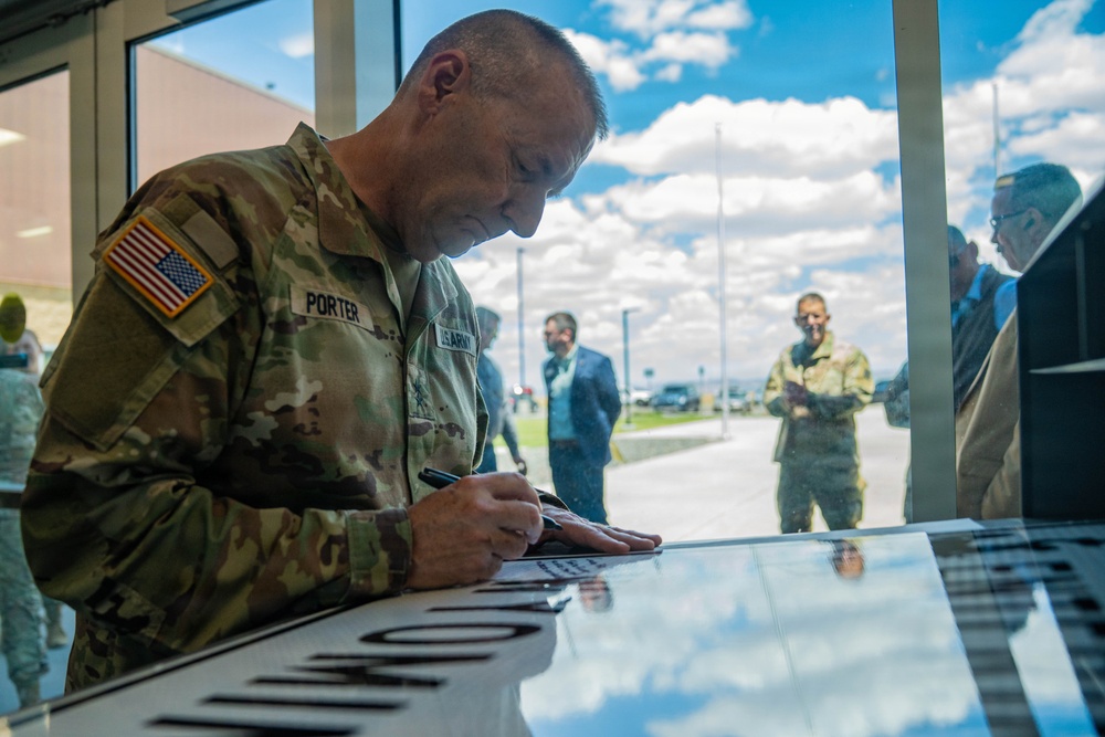 Adjutant general signs deployment tradition