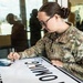Soldier signs Wyoming deployment tradition