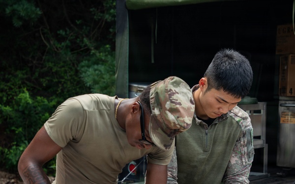Shared Meals Strengthen Allied Bonds During Combined Field Feeding Training Exercise