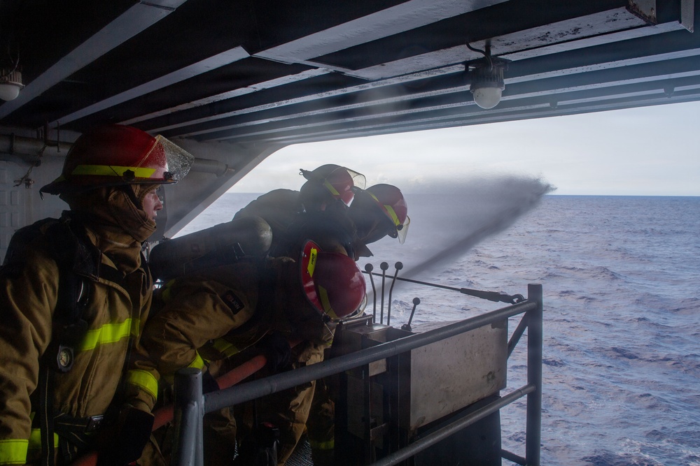 USS Theodore Roosevelt conducts general quarters drill during RIMPAC 26