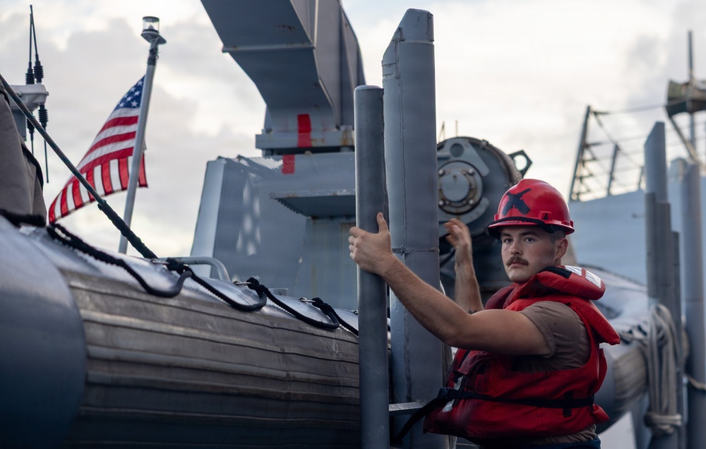 USS Mustin conducts boat operations