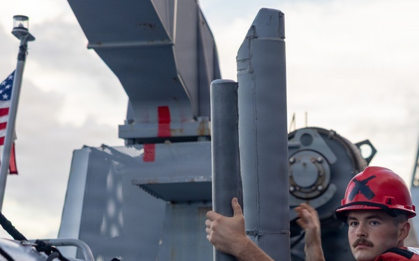 USS Mustin conducts boat operations