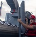USS Mustin conducts boat operations
