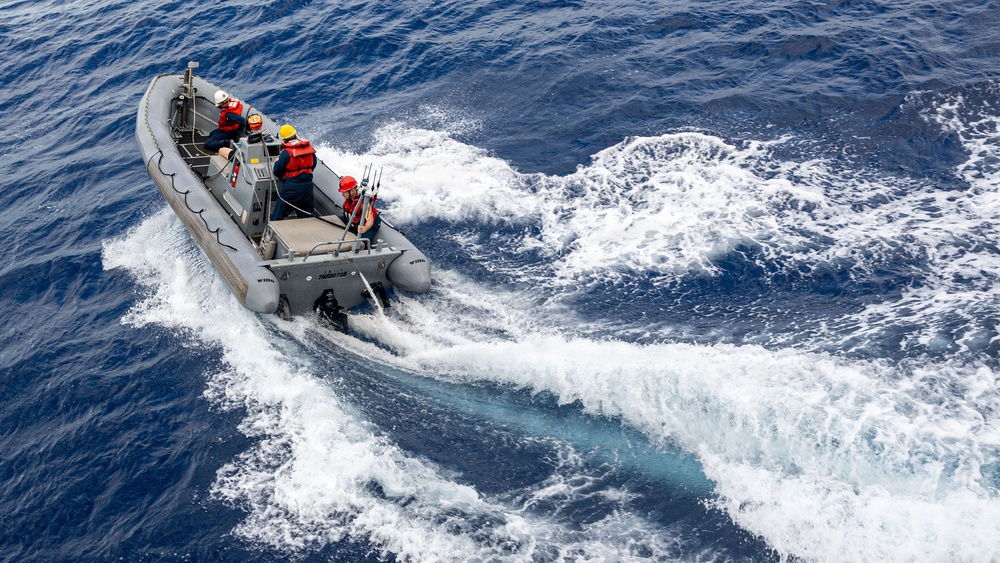 USS Mustin conducts boat operations