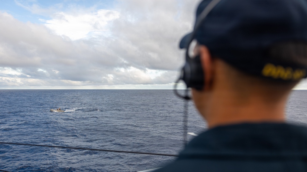 USS Mustin conducts boat operations