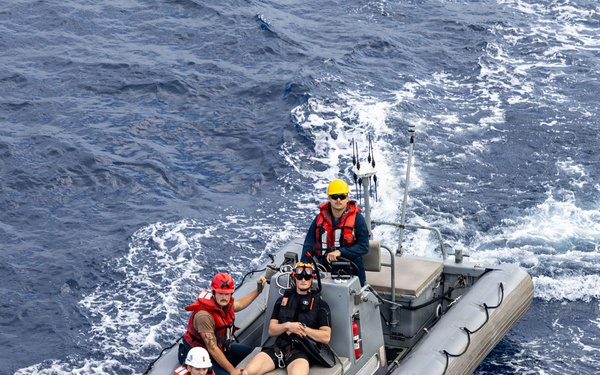 USS Mustin conducts boat operations