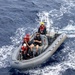 USS Mustin conducts boat operations