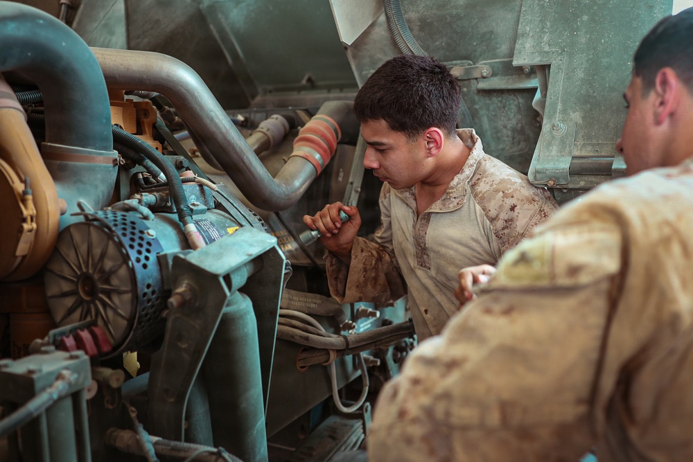 U.S. Marines conduct HIMARS routine preventative maintenance