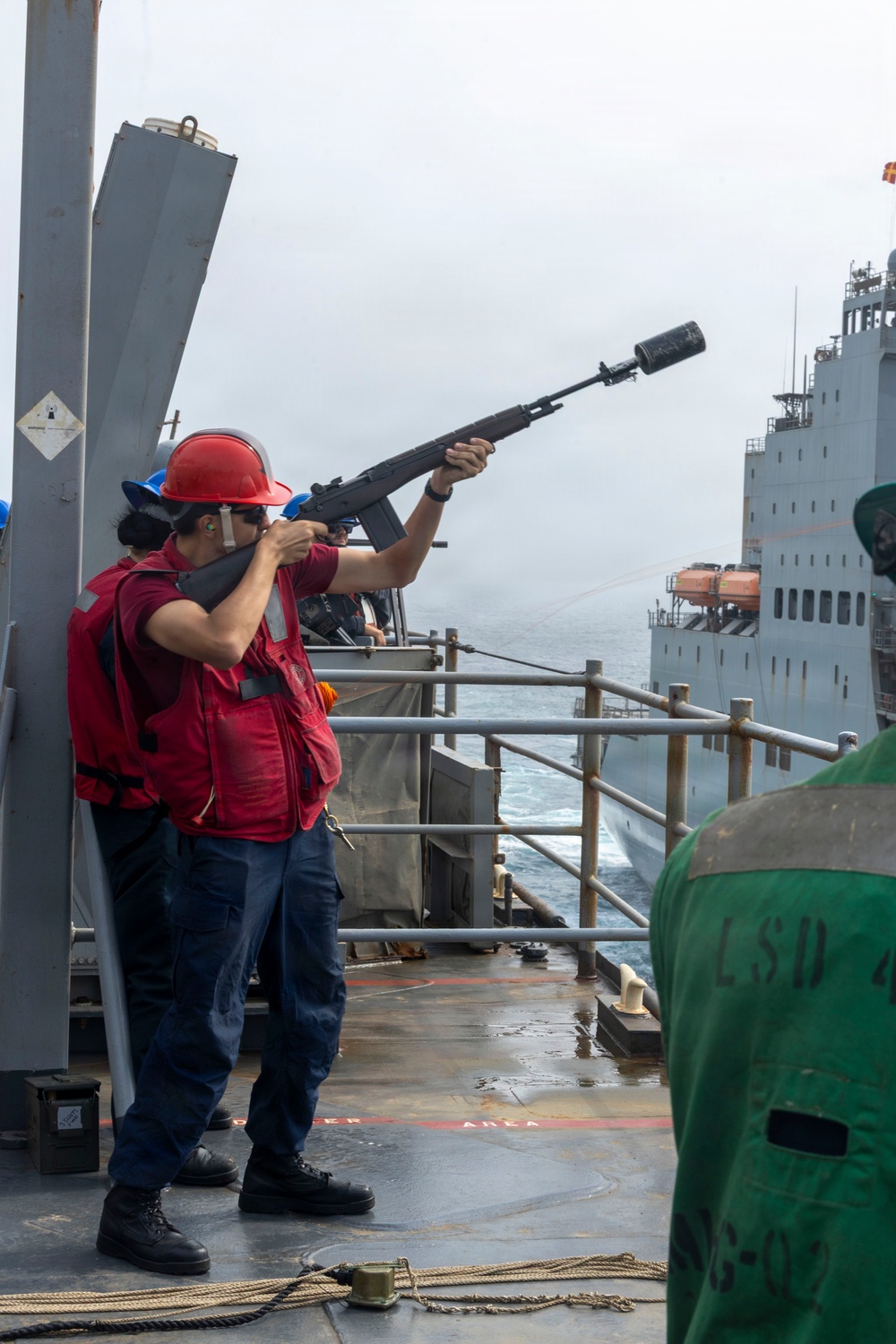 USS Comstock Conducts a Replenishment-At-Sea with USNS John Lewis