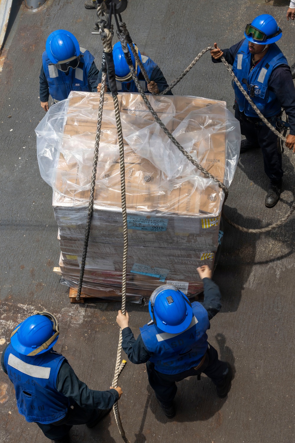 USS Comstock Conducts a Replenishment-At-Sea with USNS John Lewis