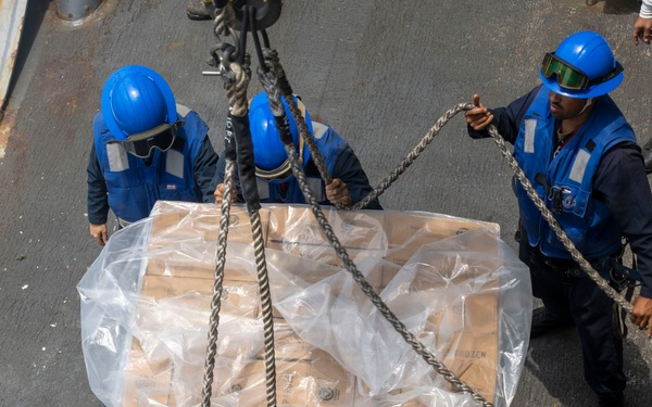 USS Comstock Conducts a Replenishment-At-Sea with USNS John Lewis