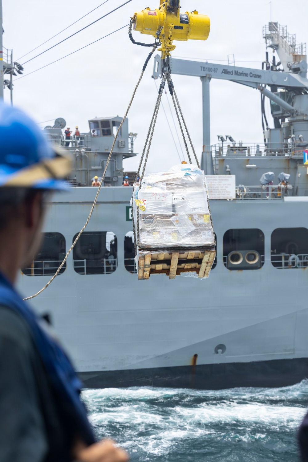 USS Comstock Conducts a Replenishment-At-Sea with USNS John Lewis