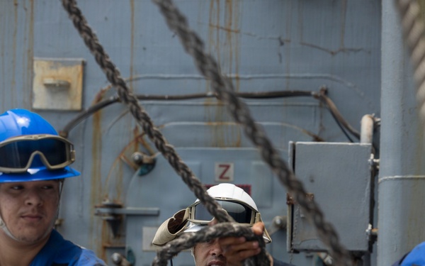 USS Comstock Conducts a Replenishment-At-Sea with USNS John Lewis