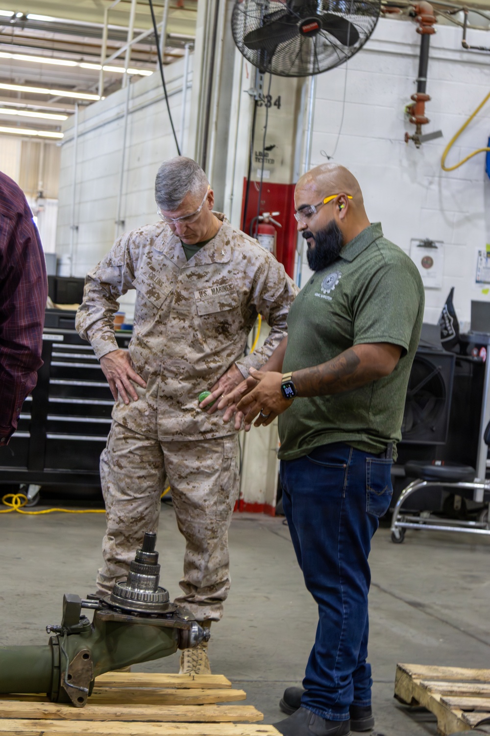 Brigadier General Kevin Collins, commanding general, Marine Corps Logistics Command, meets with civilian-Marines and tours facilities at Production Plant Barstow