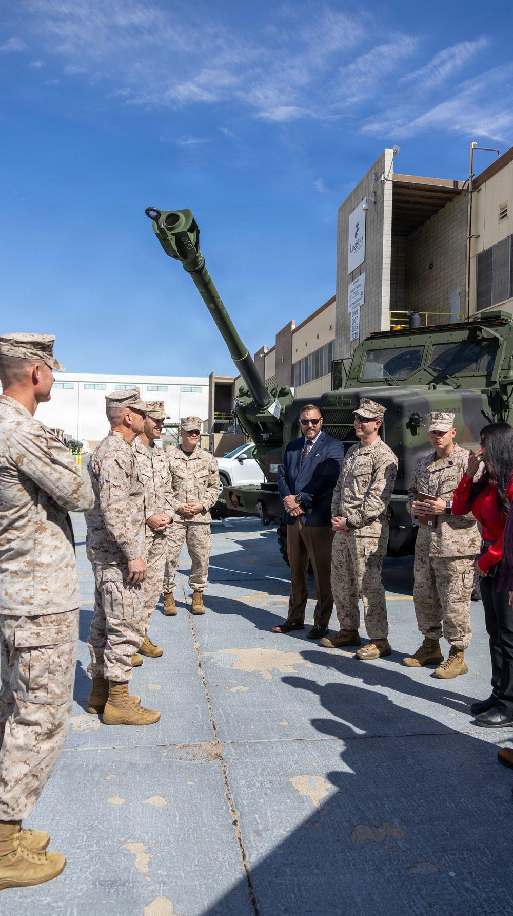 Brigadier General Kevin Collins, commanding general, Marine Corps Logistics Command tours facilities at Production Plant Barstow, California.