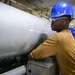 USS John C. Stennis (CVN 74) Sailor conducts maintenence