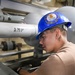 USS John C. Stennis (CVN 74) Sailor conducts maintenence