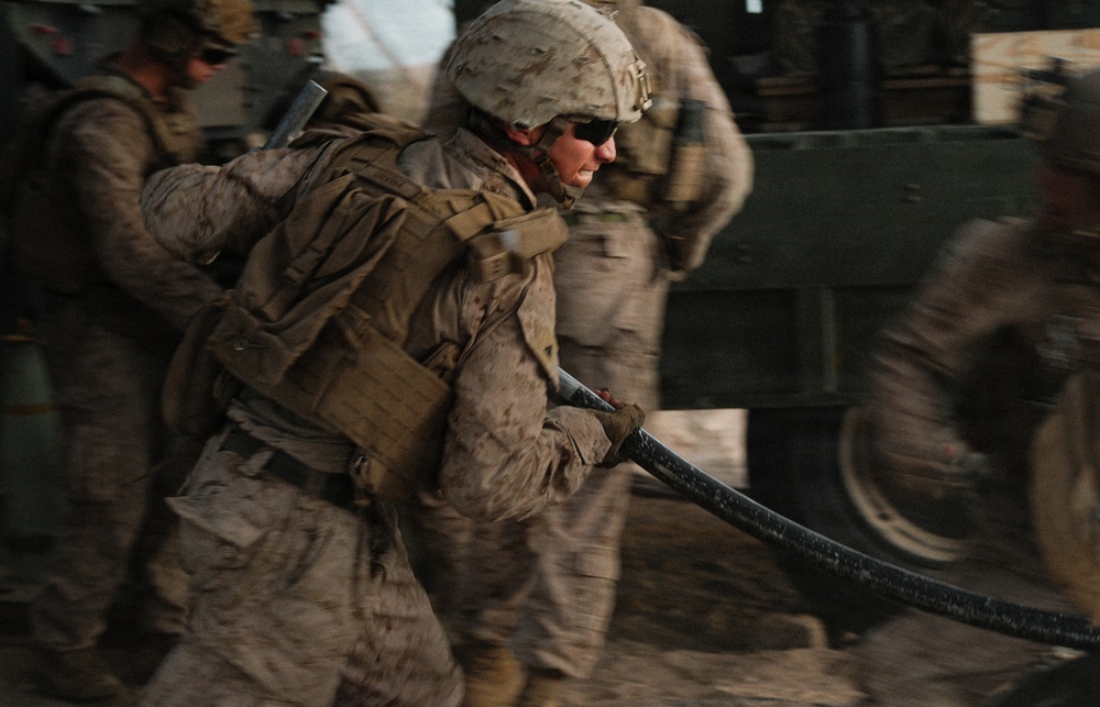Marines with 1st Battalion, 11th Marine Regiment sling rounds during FSCEX
