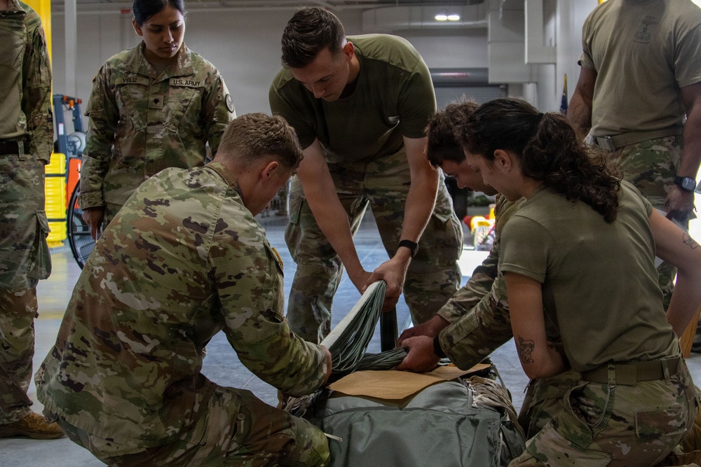 338th QM TADC prep parachutes for air drop