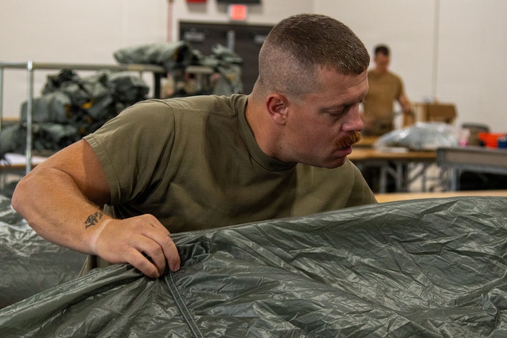 338th QM TADC prep parachutes for air drop