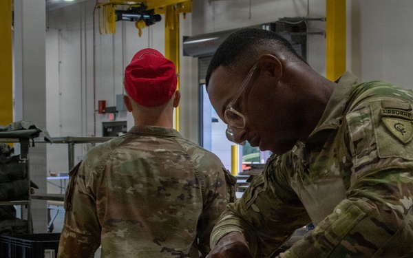 338th QM TADC prep parachutes for air drop